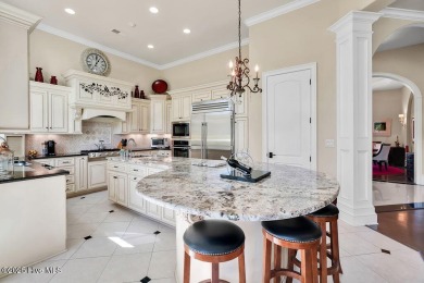 Discover refined luxury and timeless craftsmanship in this on Ocean Ridge Plantation in North Carolina - for sale on GolfHomes.com, golf home, golf lot