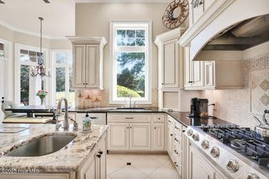 Discover refined luxury and timeless craftsmanship in this on Ocean Ridge Plantation in North Carolina - for sale on GolfHomes.com, golf home, golf lot