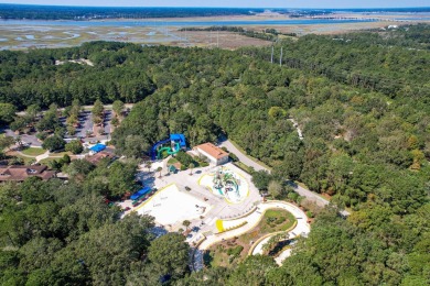 Situated on over half an acre in the heart of James Island, this on Charleston Municipal Golf Course in South Carolina - for sale on GolfHomes.com, golf home, golf lot