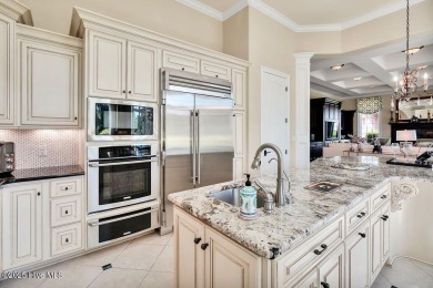 Discover refined luxury and timeless craftsmanship in this on Ocean Ridge Plantation in North Carolina - for sale on GolfHomes.com, golf home, golf lot