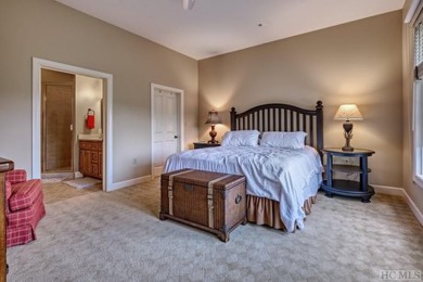 Experience luxury living in this 3-bedroom, 3-bath condominium on Old Edwards Club in North Carolina - for sale on GolfHomes.com, golf home, golf lot