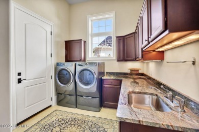 Discover refined luxury and timeless craftsmanship in this on Ocean Ridge Plantation in North Carolina - for sale on GolfHomes.com, golf home, golf lot