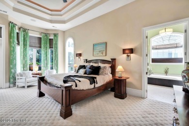 Discover refined luxury and timeless craftsmanship in this on Ocean Ridge Plantation in North Carolina - for sale on GolfHomes.com, golf home, golf lot