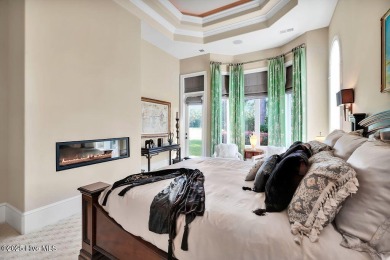 Discover refined luxury and timeless craftsmanship in this on Ocean Ridge Plantation in North Carolina - for sale on GolfHomes.com, golf home, golf lot