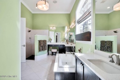 Discover refined luxury and timeless craftsmanship in this on Ocean Ridge Plantation in North Carolina - for sale on GolfHomes.com, golf home, golf lot