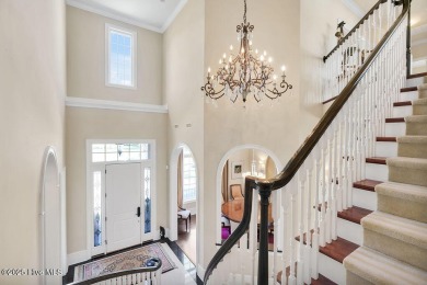 Discover refined luxury and timeless craftsmanship in this on Ocean Ridge Plantation in North Carolina - for sale on GolfHomes.com, golf home, golf lot