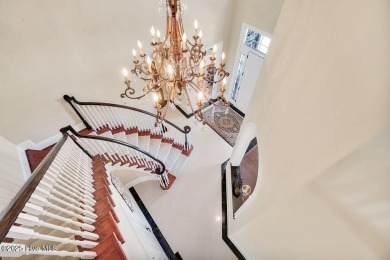 Discover refined luxury and timeless craftsmanship in this on Ocean Ridge Plantation in North Carolina - for sale on GolfHomes.com, golf home, golf lot