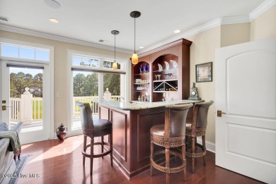 Discover refined luxury and timeless craftsmanship in this on Ocean Ridge Plantation in North Carolina - for sale on GolfHomes.com, golf home, golf lot