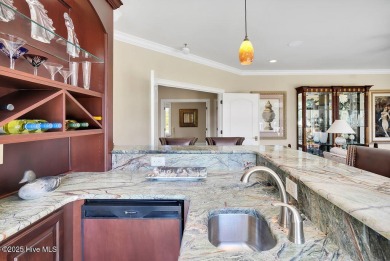 Discover refined luxury and timeless craftsmanship in this on Ocean Ridge Plantation in North Carolina - for sale on GolfHomes.com, golf home, golf lot