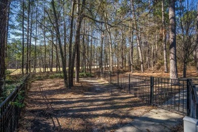 This custom, primarily one-level home with fairway views on The Golf Club At Cedar Creek in South Carolina - for sale on GolfHomes.com, golf home, golf lot