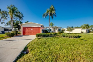 Discover a stunning, move-in ready two-bedroom, two-bathroom on Pine Lakes Country Club in Florida - for sale on GolfHomes.com, golf home, golf lot