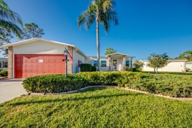 Discover a stunning, move-in ready two-bedroom, two-bathroom on Pine Lakes Country Club in Florida - for sale on GolfHomes.com, golf home, golf lot