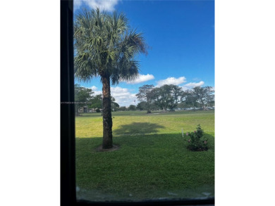 Spacious and beautiful 2-bedroom, 2-bathroom first-floor unit on Oriole Golf and Tennis Club in Florida - for sale on GolfHomes.com, golf home, golf lot
