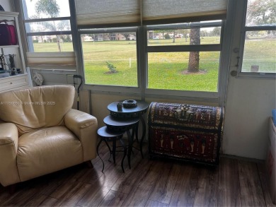 Spacious and beautiful 2-bedroom, 2-bathroom first-floor unit on Oriole Golf and Tennis Club in Florida - for sale on GolfHomes.com, golf home, golf lot