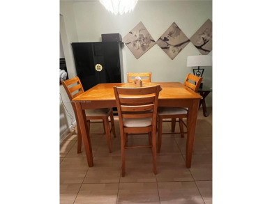 Spacious and beautiful 2-bedroom, 2-bathroom first-floor unit on Oriole Golf and Tennis Club in Florida - for sale on GolfHomes.com, golf home, golf lot