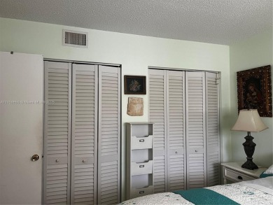 Spacious and beautiful 2-bedroom, 2-bathroom first-floor unit on Oriole Golf and Tennis Club in Florida - for sale on GolfHomes.com, golf home, golf lot
