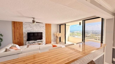 BREATHTAKING WATER VIEWS from this elegant 11th-floor corner-end on Pasadena Yacht and Country Club in Florida - for sale on GolfHomes.com, golf home, golf lot