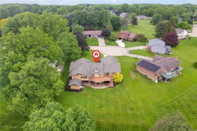 Welcome to 3752 Muirfield Dr, offering a view of the 15th green on Ohio Prestwick Country Club in Ohio - for sale on GolfHomes.com, golf home, golf lot