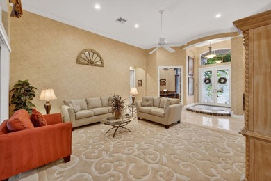 Gently used seasonal home ideally situated on a cl-de-sac street on  in Florida - for sale on GolfHomes.com, golf home, golf lot