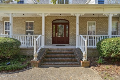 Custom-built 3BR/3.5BA brick Cape Cod situated on the 3rd on Sound Golf Links at Albemarle Plantation in North Carolina - for sale on GolfHomes.com, golf home, golf lot