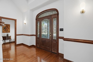 Custom-built 3BR/3.5BA brick Cape Cod situated on the 3rd on Sound Golf Links at Albemarle Plantation in North Carolina - for sale on GolfHomes.com, golf home, golf lot