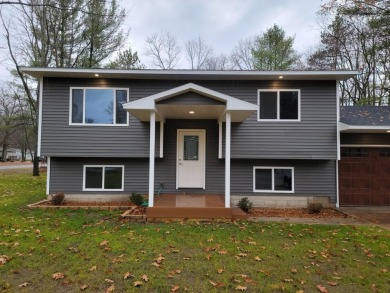 Spacious bi-level that has been fully renovated inside and out on Twin Birch Golf Club in Michigan - for sale on GolfHomes.com, golf home, golf lot