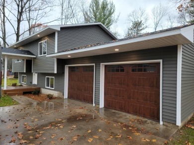 Spacious bi-level that has been fully renovated inside and out on Twin Birch Golf Club in Michigan - for sale on GolfHomes.com, golf home, golf lot