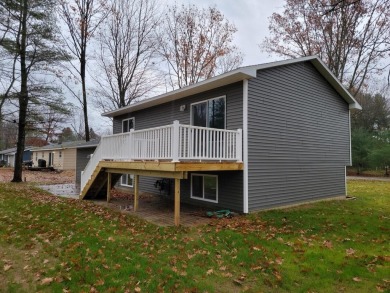 Spacious bi-level that has been fully renovated inside and out on Twin Birch Golf Club in Michigan - for sale on GolfHomes.com, golf home, golf lot