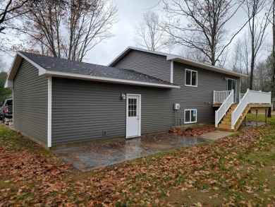 Spacious bi-level that has been fully renovated inside and out on Twin Birch Golf Club in Michigan - for sale on GolfHomes.com, golf home, golf lot