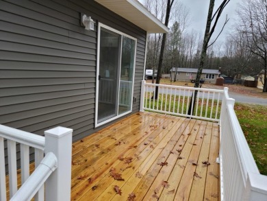 Spacious bi-level that has been fully renovated inside and out on Twin Birch Golf Club in Michigan - for sale on GolfHomes.com, golf home, golf lot