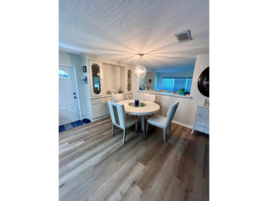 This beautiful two-bedroom, two-bath home is located in the on Pine Lakes Country Club in Florida - for sale on GolfHomes.com, golf home, golf lot