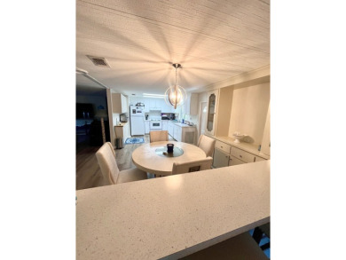 This beautiful two-bedroom, two-bath home is located in the on Pine Lakes Country Club in Florida - for sale on GolfHomes.com, golf home, golf lot