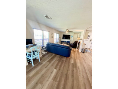 This beautiful two-bedroom, two-bath home is located in the on Pine Lakes Country Club in Florida - for sale on GolfHomes.com, golf home, golf lot