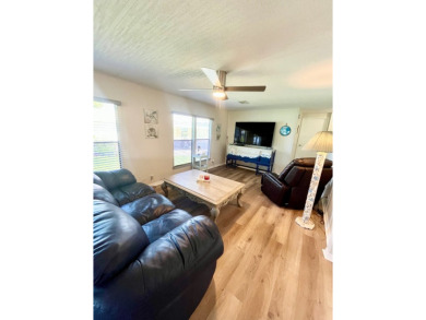This beautiful two-bedroom, two-bath home is located in the on Pine Lakes Country Club in Florida - for sale on GolfHomes.com, golf home, golf lot