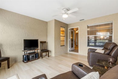 LOWEST HOA FEES IN HIGHLAND LAKES and PET FRIENDLY! Tucked away on Highland Lakes Executive Golf Course in Florida - for sale on GolfHomes.com, golf home, golf lot