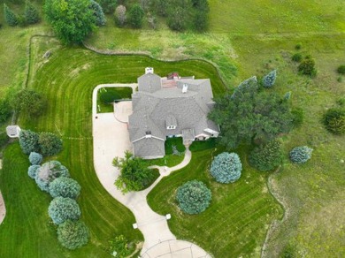 Sitting on  peaceful 2 acres in town, is this classic custom on Sioux City Country Club in Iowa - for sale on GolfHomes.com, golf home, golf lot