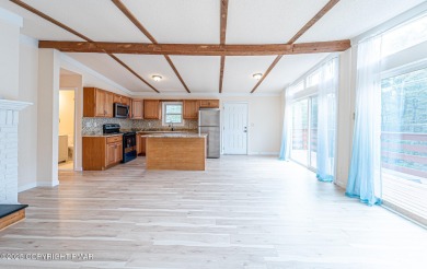 CHARMING UPGRADED POCONOS CHALET Completely Updated 3BR 2.5BA on Pocono Farms Country Club in Pennsylvania - for sale on GolfHomes.com, golf home, golf lot