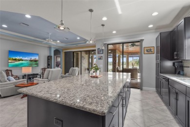 Experience resort-style living every day in this beautifully on Esplanade Golf and Country at Lakewood Ranch in Florida - for sale on GolfHomes.com, golf home, golf lot