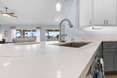 Gorgeous, meticulously renovated 2-bed, 2-bath, 2-car POND VIEW on Scepter Golf Club in Florida - for sale on GolfHomes.com, golf home, golf lot