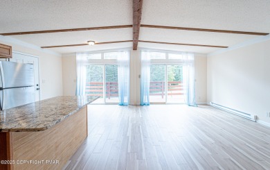 CHARMING UPGRADED POCONOS CHALET Completely Updated 3BR 2.5BA on Pocono Farms Country Club in Pennsylvania - for sale on GolfHomes.com, golf home, golf lot