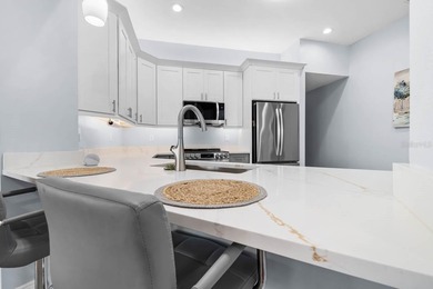 Gorgeous, meticulously renovated 2-bed, 2-bath, 2-car POND VIEW on Scepter Golf Club in Florida - for sale on GolfHomes.com, golf home, golf lot