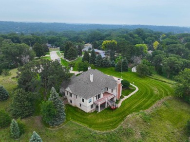 Sitting on  peaceful 2 acres in town, is this classic custom on Sioux City Country Club in Iowa - for sale on GolfHomes.com, golf home, golf lot