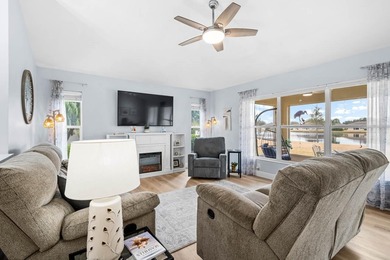 Gorgeous, meticulously renovated 2-bed, 2-bath, 2-car POND VIEW on Scepter Golf Club in Florida - for sale on GolfHomes.com, golf home, golf lot