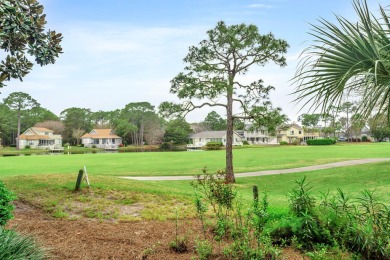 Bay and golf course views are abundant  from the porch and on Sandestin Golf and Beach Resort - The Links in Florida - for sale on GolfHomes.com, golf home, golf lot