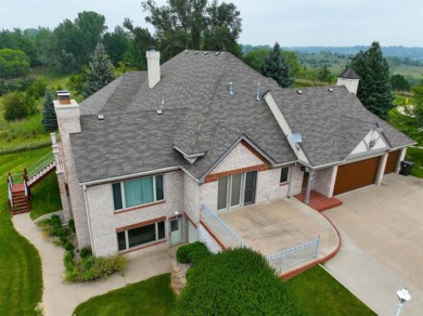 Sitting on  peaceful 2 acres in town, is this classic custom on Sioux City Country Club in Iowa - for sale on GolfHomes.com, golf home, golf lot