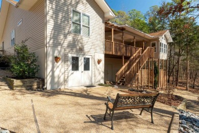 Great curb appeal with additional landscaping in this on Ponce De Leon Golf Course in Arkansas - for sale on GolfHomes.com, golf home, golf lot