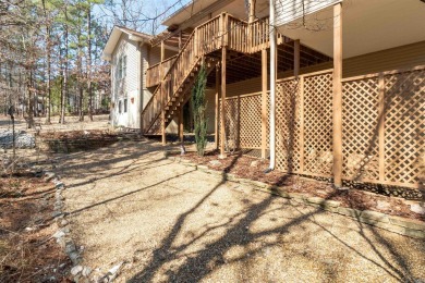 Great curb appeal with additional landscaping in this on Ponce De Leon Golf Course in Arkansas - for sale on GolfHomes.com, golf home, golf lot