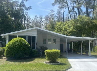 This home is located within a 55+ resort style leased land on Big Cypress Golf and Country Club in Florida - for sale on GolfHomes.com, golf home, golf lot