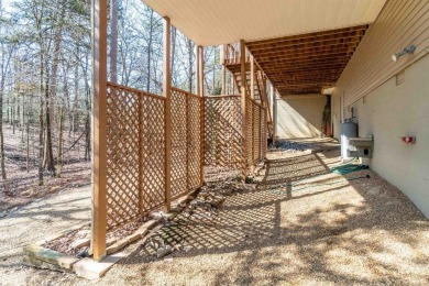 Great curb appeal with additional landscaping in this on Ponce De Leon Golf Course in Arkansas - for sale on GolfHomes.com, golf home, golf lot