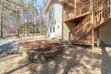 Great curb appeal with additional landscaping in this on Ponce De Leon Golf Course in Arkansas - for sale on GolfHomes.com, golf home, golf lot